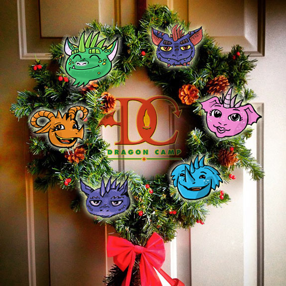 Holiday wreath featuring all the Faces of Dragon Camp Members surrounding the Camp Logo